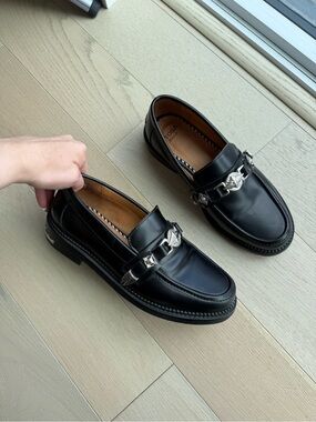 TOGA Pulla Black Leather Loafers with Silver Chain Detail